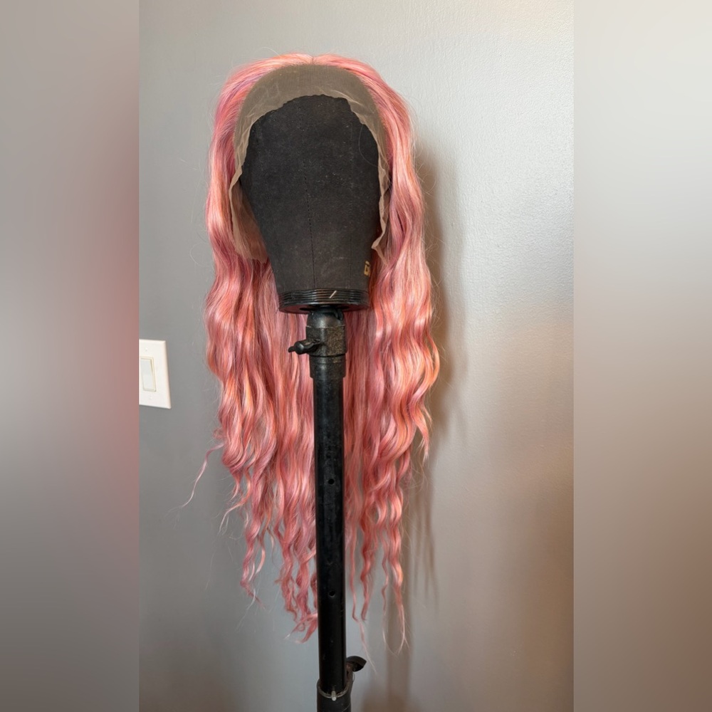 Brand new 13x3 multi-tonal pink synthetic wig. 26 inches